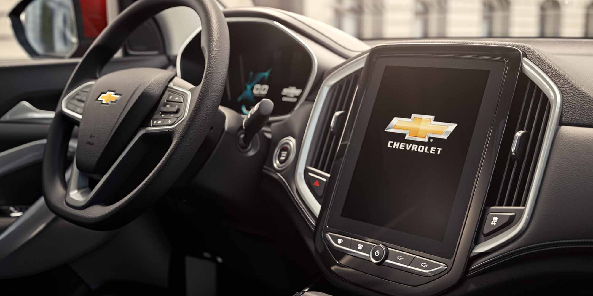 Interior de Chevrolet Captiva XL con volante multifunción y pantalla táctil